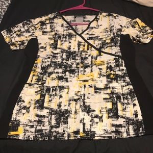 Cherokee scrub top. Black, yellow, and white.